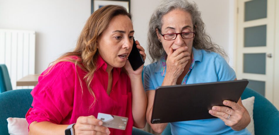 Two women realize they have been scammed while shopping online.